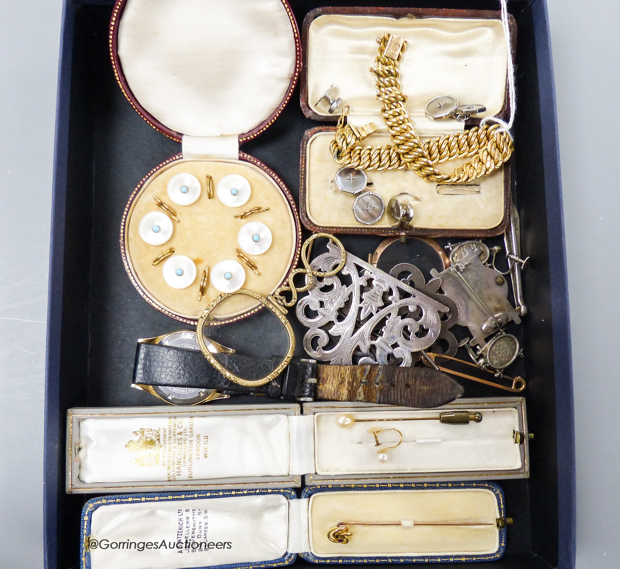A small quantity of mixed jewellery, including gilt metal bracelet, two sticks pins, white metal aesthetic brooch and pair of matching earrings, cased mother of pearl stud set, gent's Bucherer watch, plated belt buckle,